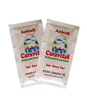 Sachês de Açúcar Caravelas Dois sachês de açúcar da marca Caravelas